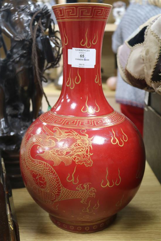 A Chinese red ground dragon vase